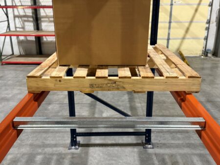 Wood Pallet on Hat Style Pallet Supports Wood Pallet on Hat Style Pallet Supports