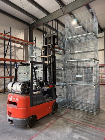 Wire Containers Stacked 4 High with Forklift pic