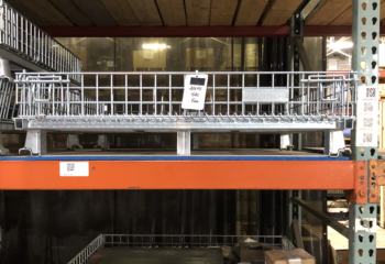 Wire-Basket-Containers-with-Flat-Runners-stored-in-Pallet-Racking