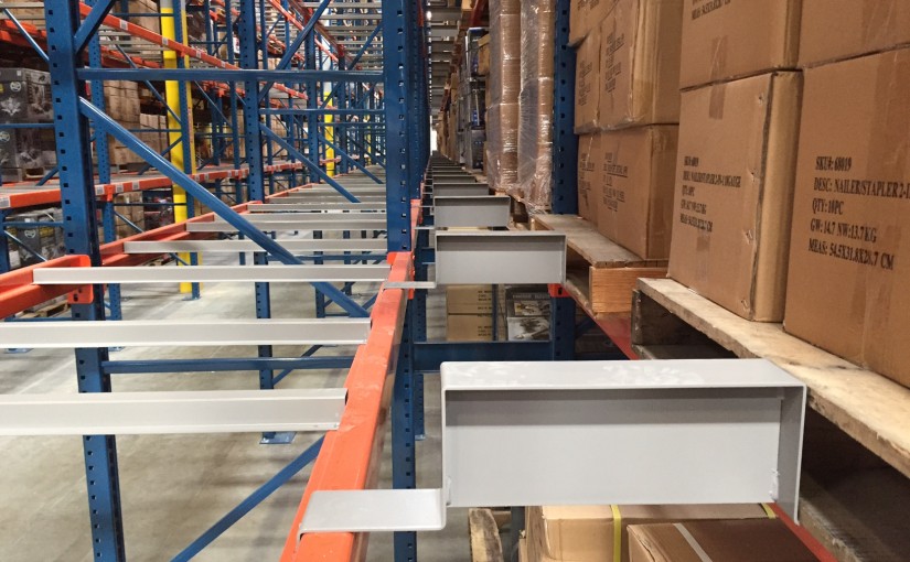 How much of a flue space is required between back to back rows of pallet rack?